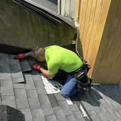 Andes Roofing - Myself repairing step flashing along a firewall.