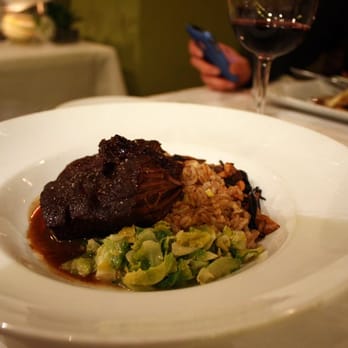 Fat Canary - Braised boneless beef short ribs with faro, wild mushrooms, and brussels sprouts. - New American Near Me - Williamsburg, Virginia