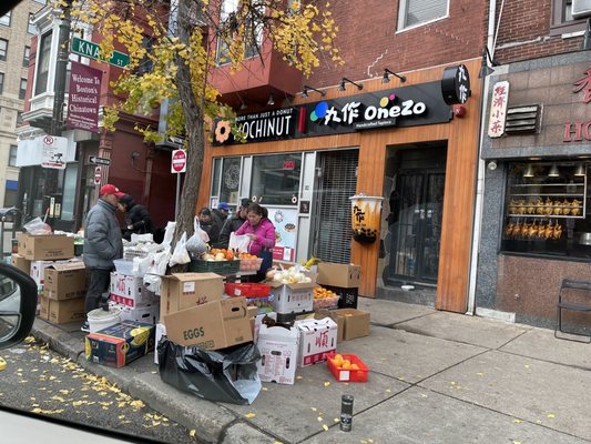 Photo of Chinatown - Boston, MA, US. My favorite street vendor out in front of Hong Kong eatery. Excellent buys on bread, fruits greens, etc..