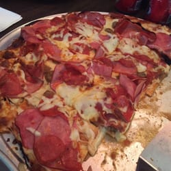 Corner Bar & Restaurant - Meat lover's pizza.