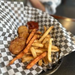 The Bunker Bar And Grille - Kids chicken nuggets with fries (plus some of my sweet potato fries)