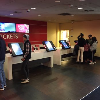 AMC Factoria 8 - Automated ticket purchase kiosks. (If elected, Andrew Yang would put a VAT on these to help fund UBI) - Cinema Near Me - Bellevue, Washington AMC Factoria 8 - Automated ticket purchase kiosks. (If elected, Andrew Yang would put a VAT on these to help fund UBI) - Cinema Near Me - Bellevue, Washington