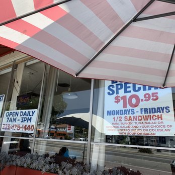 Armon's Restaurant - a man sitting under an umbrella - Breakfast & Brunch Near Me - Los Angeles, California Armon's Restaurant - a man sitting under an umbrella - Breakfast & Brunch Near Me - Los Angeles, California