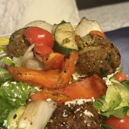 Salad with the fried chickpea cake. Salad with the fried chickpea cake.