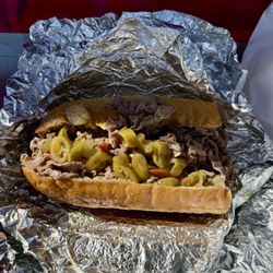 Wize Guys Beefs - Italian beef sandwich, wet, with spicy peppers, and American cheese. Flavorful!