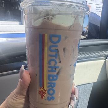 Dutch Bros Coffee - Chocolate milk with cookie flavoring and soft top.. medium cup - Juice Bars & Smoothies Near Me - Rancho Cordova, California Dutch Bros Coffee - Chocolate milk with cookie flavoring and soft top.. medium cup - Juice Bars & Smoothies Near Me - Rancho Cordova, California