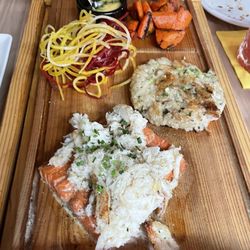 Planked salmon topped with crab