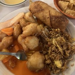 Sweet and sour chicken, fried rice and egg roll Sweet and sour chicken, fried rice and egg roll