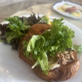Le Petit Paris - Brie, Honey, & Walnut croissant with ham added - French Near Me - Atlantic Beach, Florida Le Petit Paris - Brie, Honey, & Walnut croissant with ham added - French Near Me - Atlantic Beach, Florida