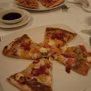 Alioli Ristorante - Pizza Pastore appetizer - pizza with goat cheese, bell pepper and sundried tomatoes - Italian Near Me - Mississauga, Ontario Alioli Ristorante - Pizza Pastore appetizer - pizza with goat cheese, bell pepper and sundried tomatoes - Italian Near Me - Mississauga, Ontario