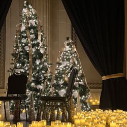 The Trust Performing Arts Center - The Candlelight Concert's illuminated stage is set for a new holiday classic experience