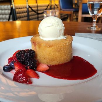 Ocean Prime - Butter Cake with fresh mixed berries, vanilla ice cream and raspberry sauce - Seafood Near Me - Beverly Hills, California Ocean Prime - Butter Cake with fresh mixed berries, vanilla ice cream and raspberry sauce - Seafood Near Me - Beverly Hills, California