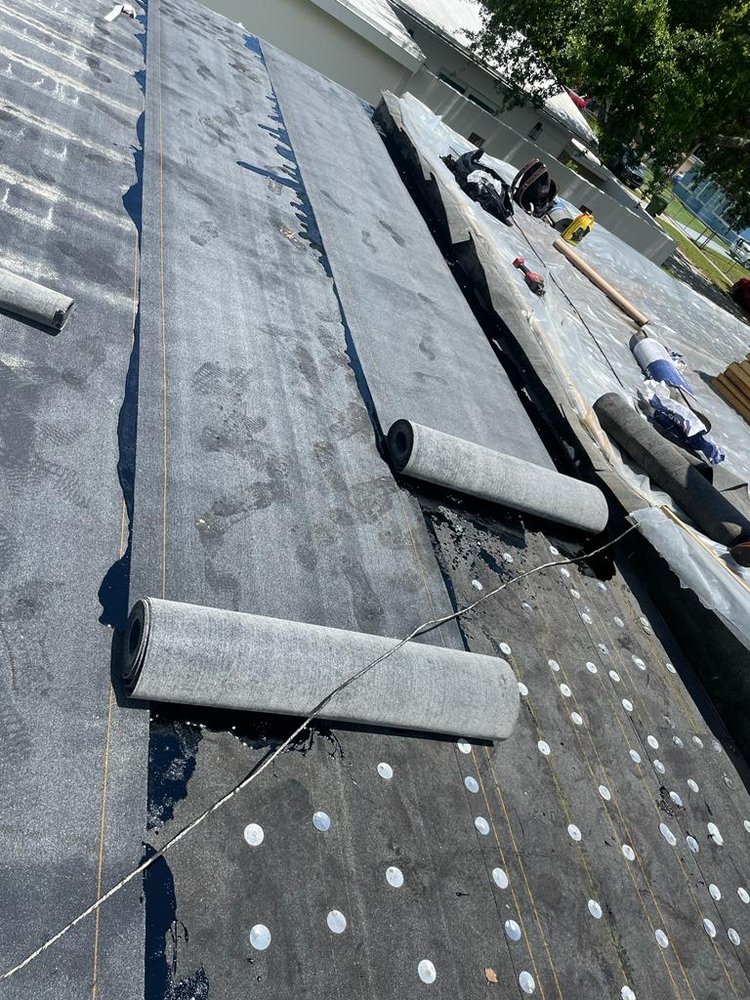 Slide of Dynasty Roofing