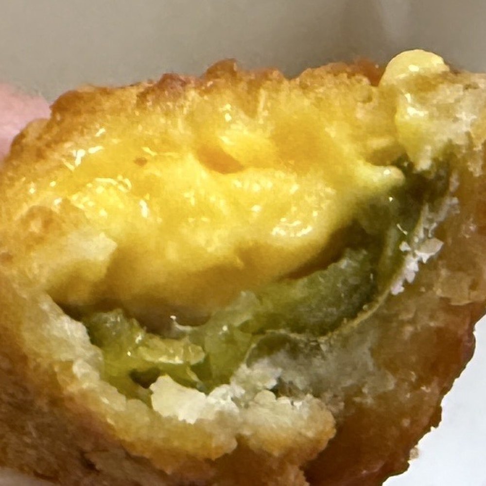 Bush's Chicken - North Austin - This is the inside of the jalapeño popper!! So cheesy!! Yum! - Fast Food Near Me - Cedar Park, Texas