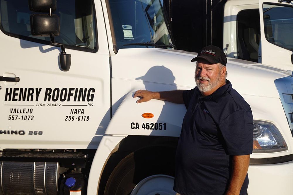 Slide of Henry Roofing