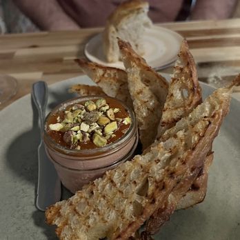 Osteria Il Muro - Chicken liver pate with apricot jam and pistachios. Kicking myself for not buying more to go. - Italian Near Me - Denton, Texas Osteria Il Muro - Chicken liver pate with apricot jam and pistachios. Kicking myself for not buying more to go. - Italian Near Me - Denton, Texas