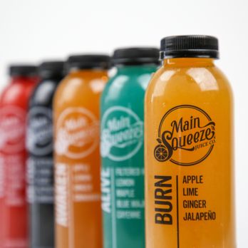 Main Squeeze Juice - a row of juice bottles - Juice Bars & Smoothies Near Me - Murfreesboro, Tennessee Main Squeeze Juice - a row of juice bottles - Juice Bars & Smoothies Near Me - Murfreesboro, Tennessee