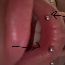 Gold Dust Tattoos & Fine Art - Awkward under angel, one obviously pierced out of my mouth and the other inside.