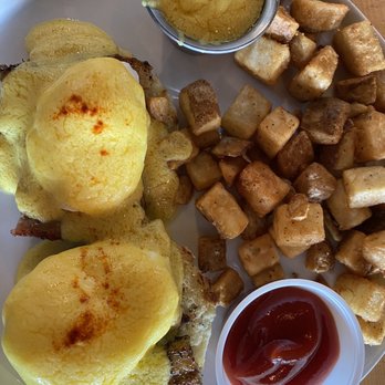 Lovely Day Cafe - Pork Belly Eggs Benedict, broken hollandaise sauce - Breakfast & Brunch Near Me - Bedford, Texas Lovely Day Cafe - Pork Belly Eggs Benedict, broken hollandaise sauce - Breakfast & Brunch Near Me - Bedford, Texas
