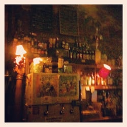 Little Kings Shuffle Club - The fridge changes the beers on draft. Fully stocked bar. Low lighting as you can tell--gives this place a cozy vibe.