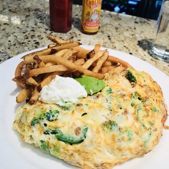 Meli Cafe - Spicy flamenco with broccoli - Breakfast & Brunch Near Me - Chicago, Illinois Meli Cafe - Spicy flamenco with broccoli - Breakfast & Brunch Near Me - Chicago, Illinois