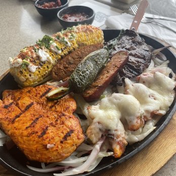 Azteca D'Oro Mexican Restaurant Lake Nona - Chicken shrimp steak dish. Delish - Mexican Near Me - Orlando, Florida Azteca D'Oro Mexican Restaurant Lake Nona - Chicken shrimp steak dish. Delish - Mexican Near Me - Orlando, Florida
