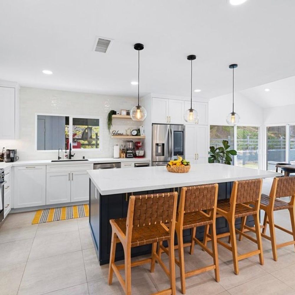 Unique Home Builders - a kitchen and dining area - Masonry/Concrete Near Me - Encino, California