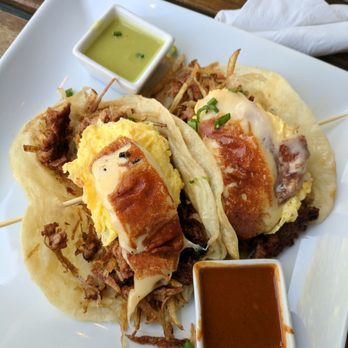 Onefold - Breakfast tacos. One sausage, one chorizo. Grilled cheese slice on top really makes the taco. Love the green sauce. - Breakfast & Brunch Near Me - Denver, Colorado Onefold - Breakfast tacos. One sausage, one chorizo. Grilled cheese slice on top really makes the taco. Love the green sauce. - Breakfast & Brunch Near Me - Denver, Colorado