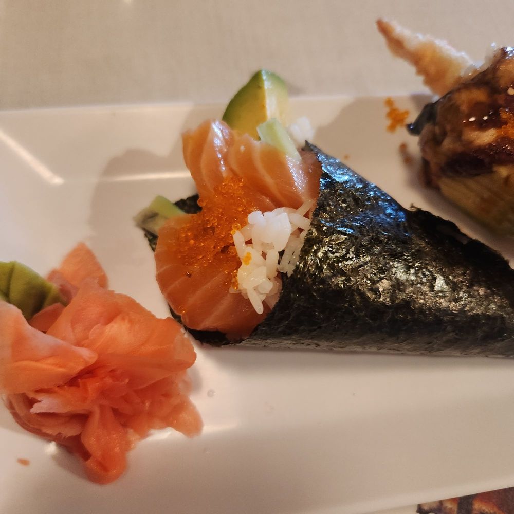 Off The Hook Sushi - Handroll ~salmon with cucumber - Sushi Bars Near Me - Fort Bragg, California Off The Hook Sushi - Handroll ~salmon with cucumber - Sushi Bars Near Me - Fort Bragg, California