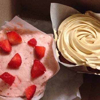 Funny Face Bakery - Strawberry frosting on chocolate cupcake and banana cupcake with peanut butter frosting. - Cupcakes Near Me - New York, New York