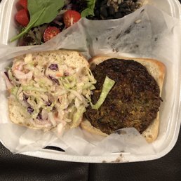Fish sandwich, side salad, black beans and rice Fish sandwich, side salad, black beans and rice