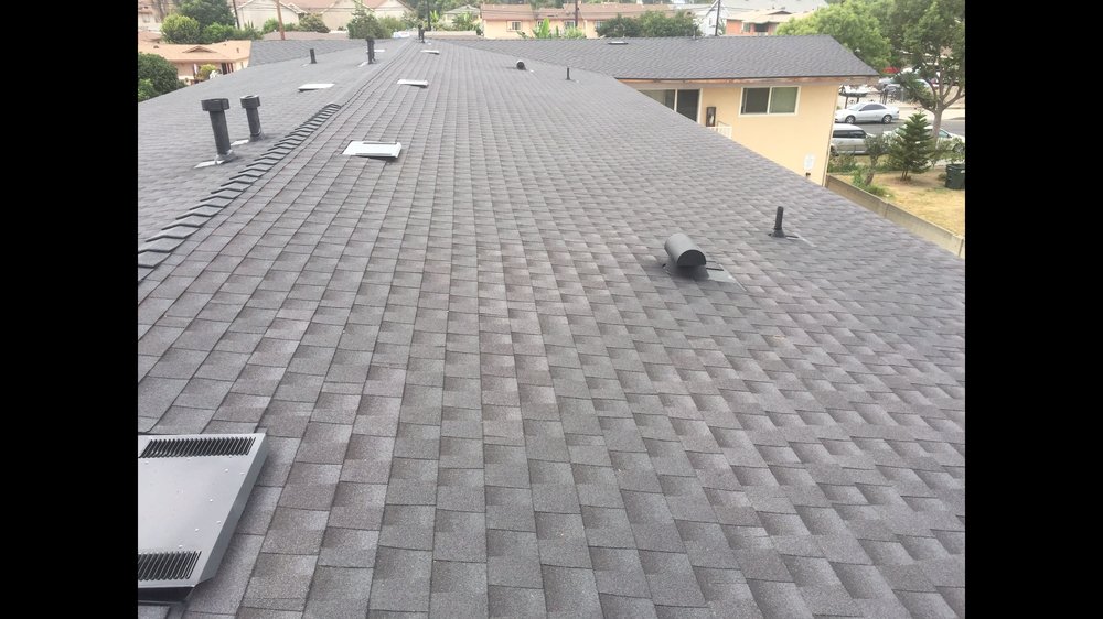 Slide of Ruiz Roofing Construction