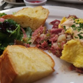 Perly's - Corn beef hash, challauh bread and pickled onions and lettuce as a garnishment. - Delis Near Me - Richmond, Virginia