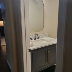 Champion Restoration - Small half bath that was completely overhauled.