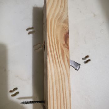 Krisako Construction - Another piece of wood that had a nail that was not completely anchored to the floor of the kitchen - General Contractors Near Me