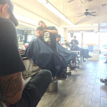 The Outsiders Barber Shop - Rob taking a break. - Barbers Near Me - Bellflower, California