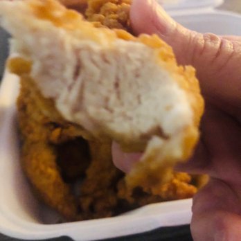 Raising Cane's Chicken Fingers - Inside of the Chicken tender, thick piece of Chicken, cooked to perfection - Fast Food Near Me - Glendora, California