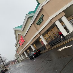 a car parked in front of the store