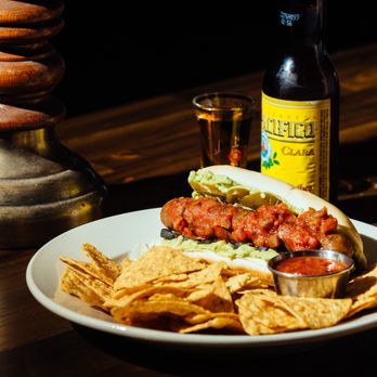 Infinity Room - Taco Dog pictured with Pacifico and Hornitos. - Music Venues Near Me - Salem, Oregon Infinity Room - Taco Dog pictured with Pacifico and Hornitos. - Music Venues Near Me - Salem, Oregon