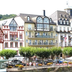 Hotel Günther garni - View of the hotel from the boat.