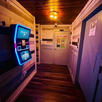 Pleasant Bar - a vending machine in a hallway - Sports Bars Near Me - Pittsburgh, Pennsylvania
