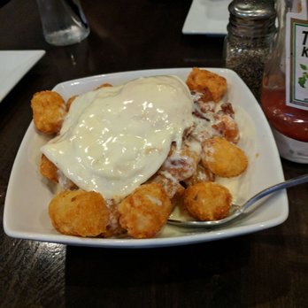 5 West Pub - Tater tots work a fried egg, bacon, and parmesan cheese sauce - Pubs Near Me - North Cape May, New Jersey