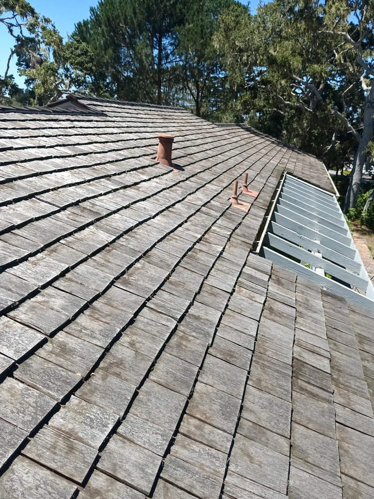 Slide of Rick's Roof & Gutter Cleaning Service