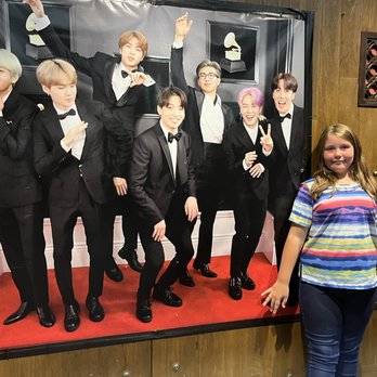 Seoul B.B.Q - Our granddaughter wanted to take a photo in the entryway. Apparently she enjoys K-pop music and she pointed her favorites in the group. - Korean Near Me - New Britain, Connecticut
