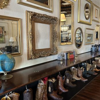 The Gathery - a row of boots lined up on a shelf - Cafes Near Me - Bellville, Texas The Gathery - a row of boots lined up on a shelf - Cafes Near Me - Bellville, Texas
