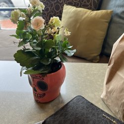 Katie Made Bakery - Cute table decor. Can't wait for my breakfast sandwich.