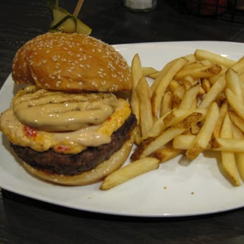 The Row - The Row Burger with pimento cheese and a fried green tomato. - Southern Near Me - Nashville, Tennessee The Row - The Row Burger with pimento cheese and a fried green tomato. - Southern Near Me - Nashville, Tennessee