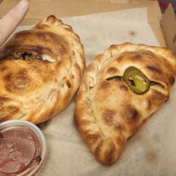 Pizza Port - The mini calzones appetizer 2/$9 two topping each they are large because I have big hands! - Pizza Near Me - Morro Bay, California