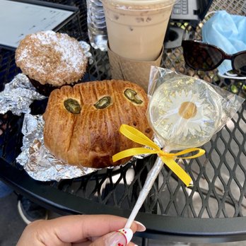 PRESS Coffee - Caramel Latte, Lemon Blueberry Muffin, Cheddar Jalapeño Kolache with Sausage, and flower lollipop - Coffee & Tea Near Me - San Antonio, Texas PRESS Coffee - Caramel Latte, Lemon Blueberry Muffin, Cheddar Jalapeño Kolache with Sausage, and flower lollipop - Coffee & Tea Near Me - San Antonio, Texas