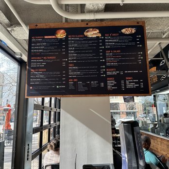 The Melt - a menu on a wall in a restaurant - Burgers Near Me - Oakland, California The Melt - a menu on a wall in a restaurant - Burgers Near Me - Oakland, California
